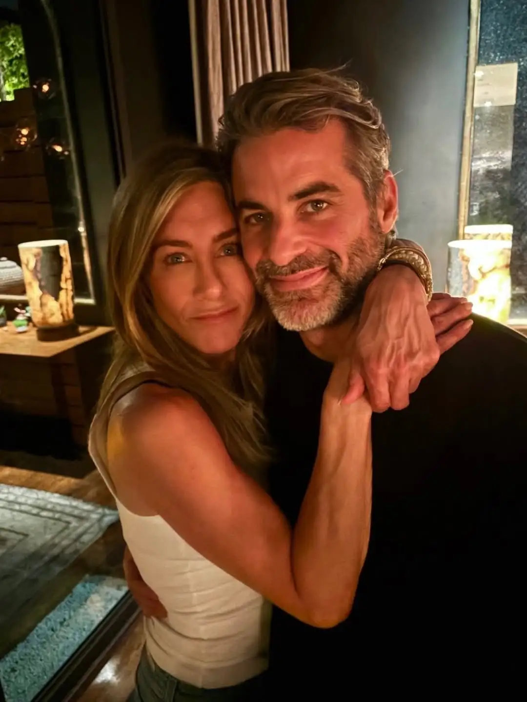 Jennifer Aniston Cuddles Up With Boyfriend Jim Curtis in New Photo