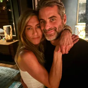 Jennifer Aniston Cuddles Up With Boyfriend Jim Curtis in New Photo