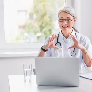 Telemedicine.,Middle,Age,Female,Doctor,Making,Video,Call,Or,Live