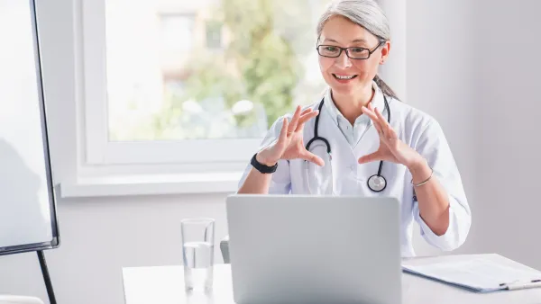 Telemedicine.,Middle,Age,Female,Doctor,Making,Video,Call,Or,Live