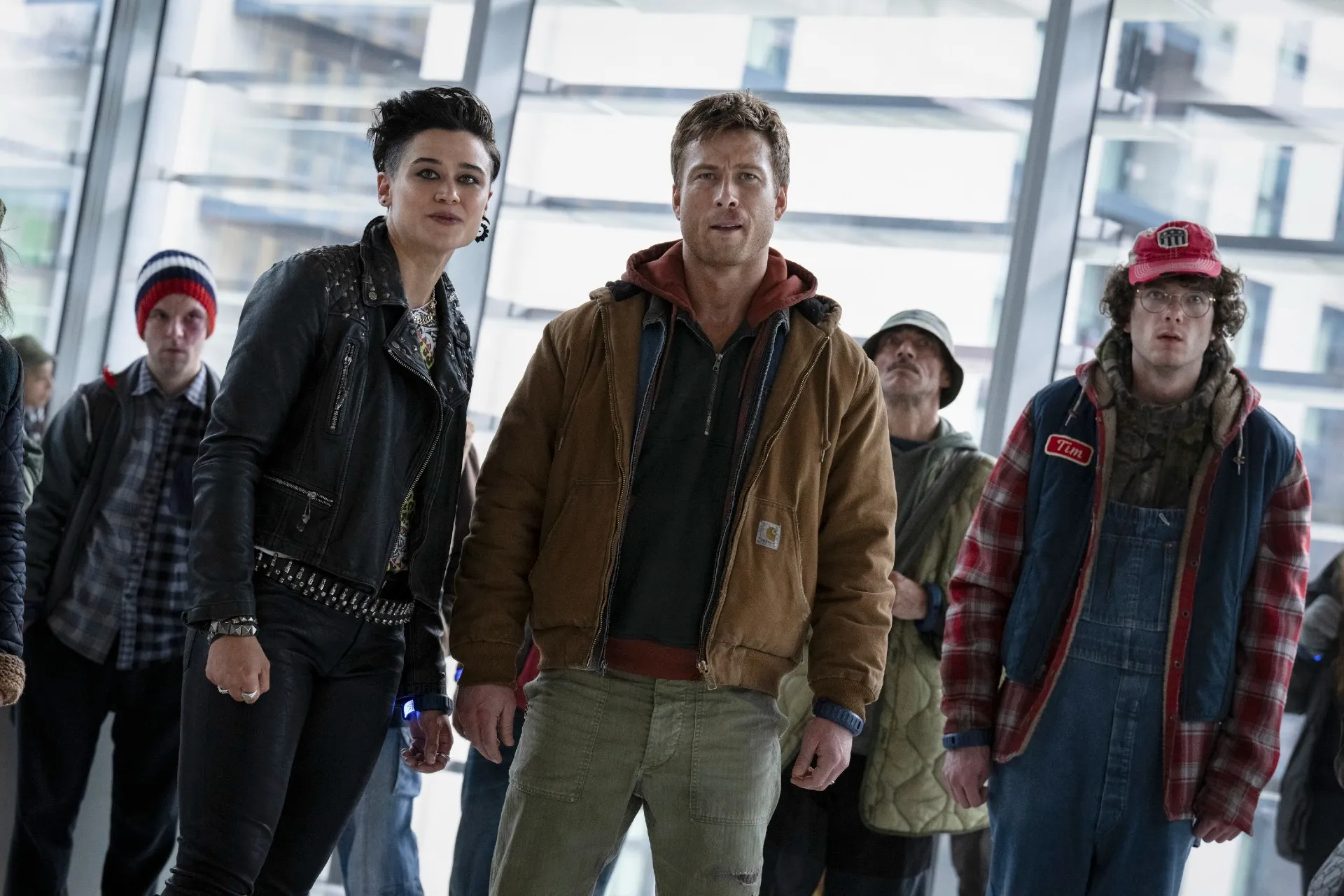 Katy O'Brian, Glen Powell and Martin Herlihy in The Running Man