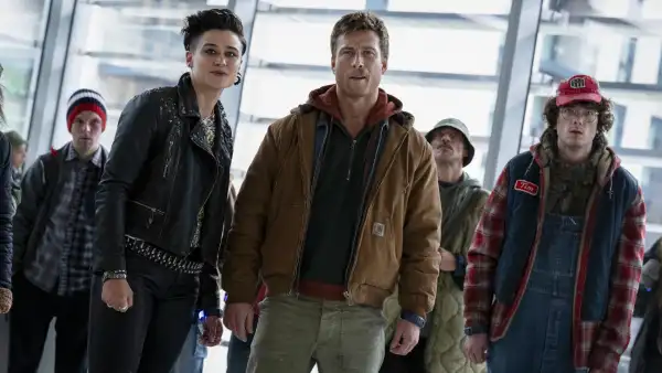 Katy O'Brian, Glen Powell and Martin Herlihy in The Running Man