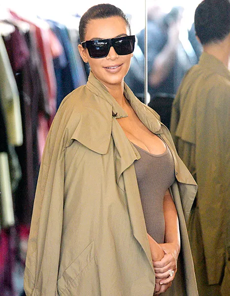 Kim Kardashian (smiling)