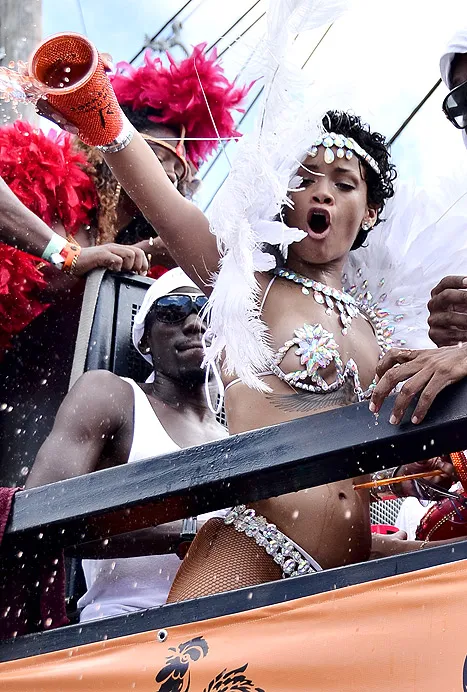 rihanna dumps liquor on people