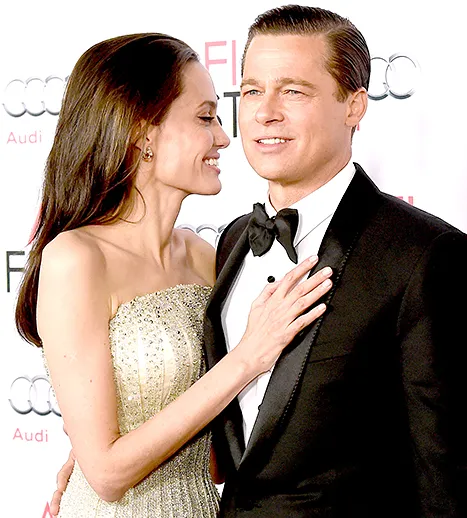 Angie embracing Brad