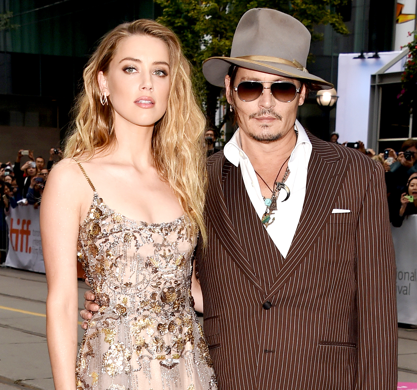 Amber Heard and Johnny Depp attend "The Danish Girl" premiere during the 2015 Toronto International Film Festival.