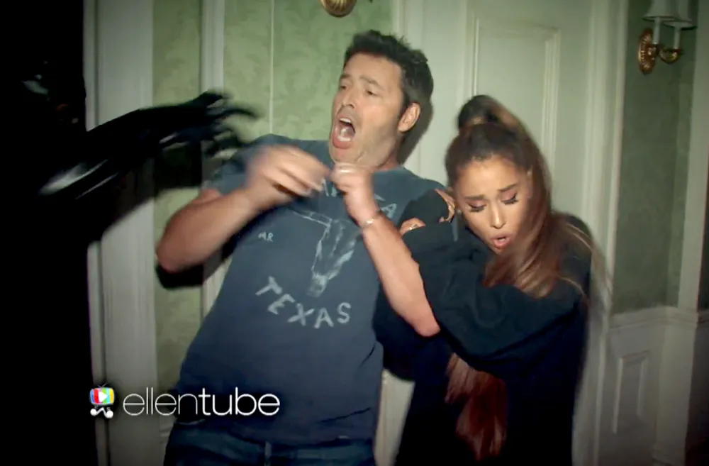 Andy Lassner and Ariana Grande