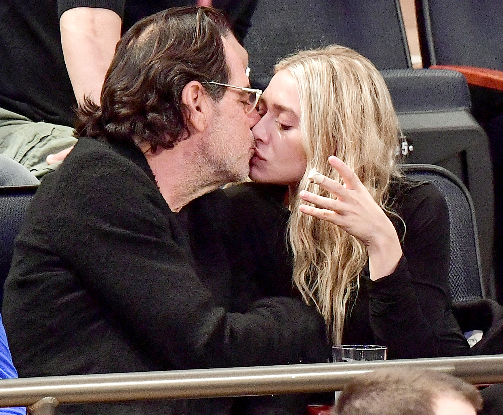 Ashley Olsen and Richard Sachs attend the New York Knicks vs. Brooklyn Nets game at Madison Square Garden on Nov. 9, 2016, in New York City.