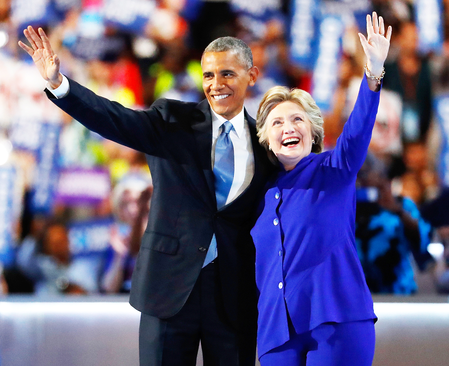 Barack hillary waving b0f7d05b 36ba 422f ba8a 3ddd0b2ad8f1