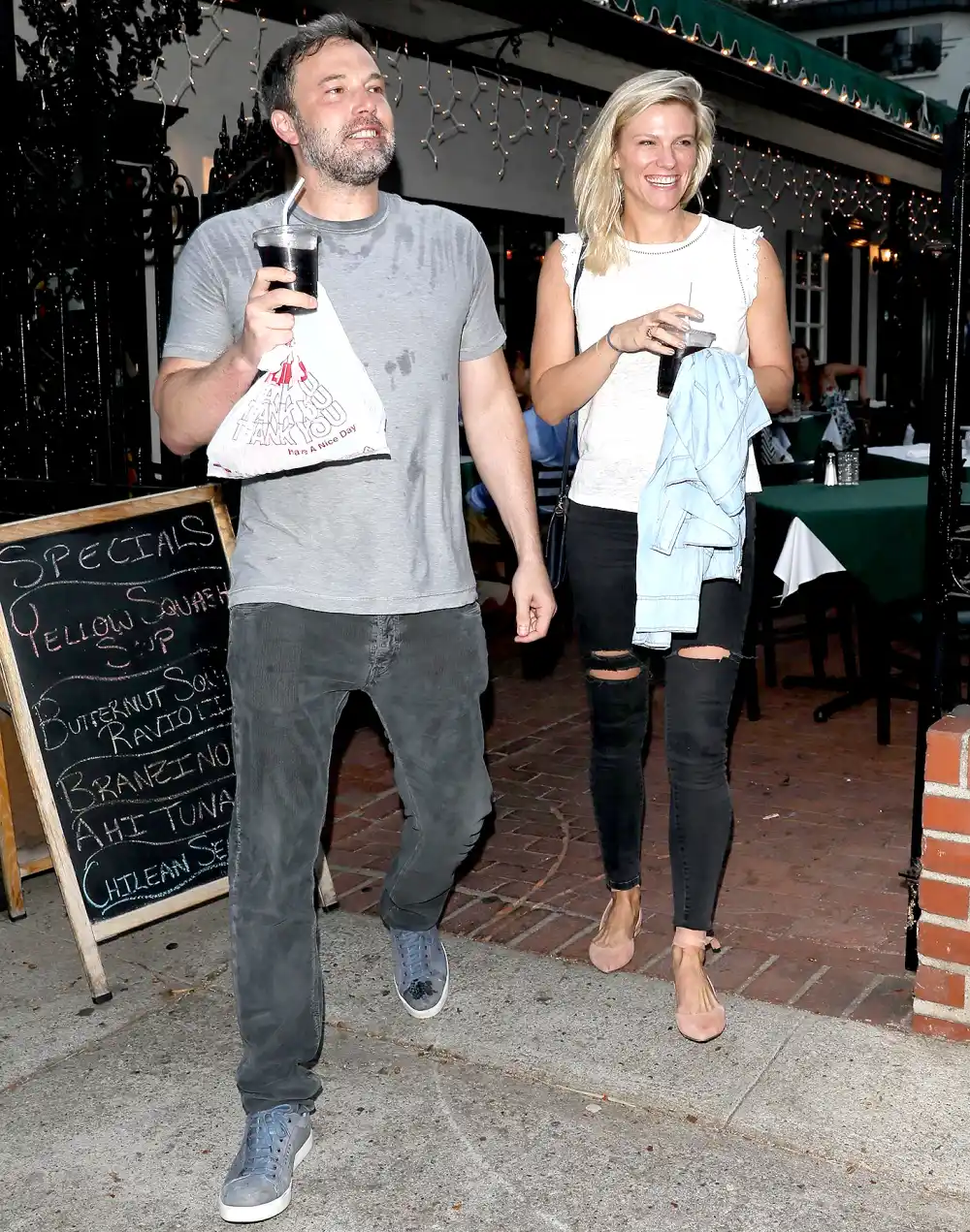 Ben Affleck exits the Beech Street Cafe restaurant after having some pizza with Lindsay Shookus on July 10, 2017.