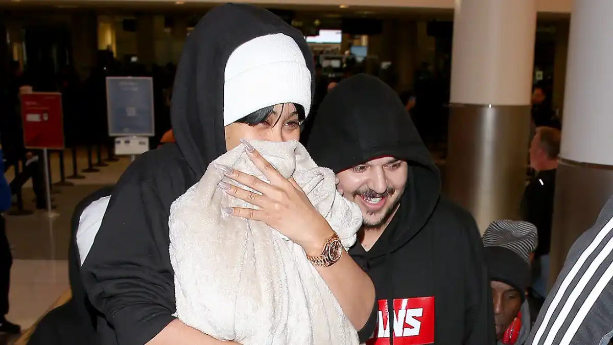 Blac Chyna and Rob Kardashian arrive together at LAX.