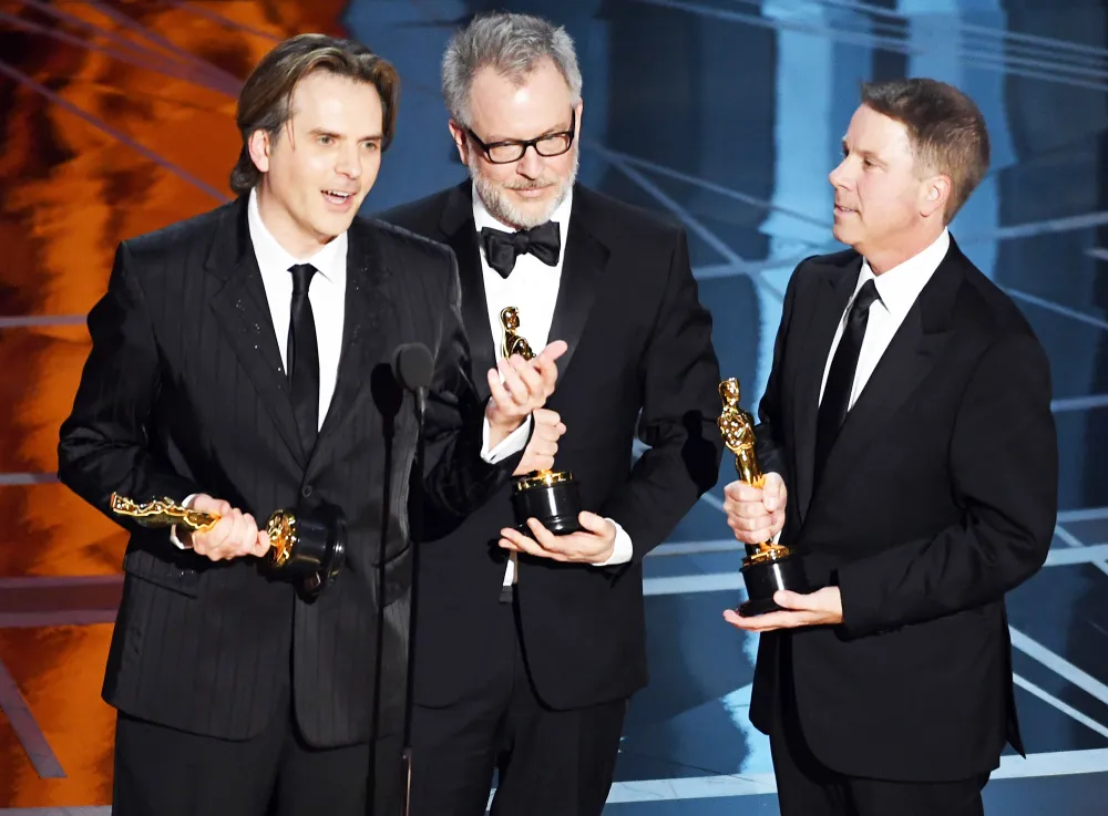 Byron Howard and Rich Moore and Clark Spencer