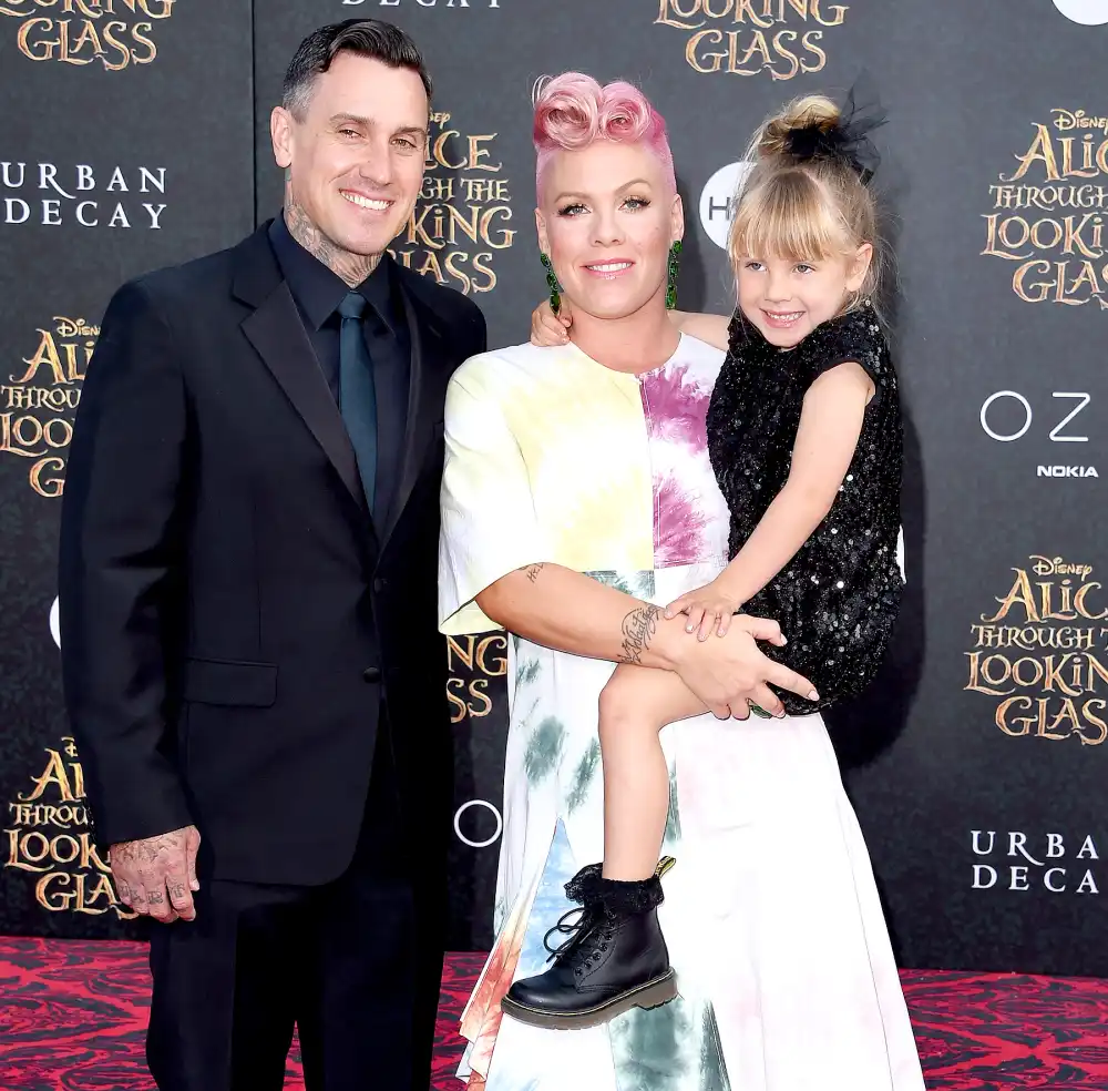 Carey Hart, Pink and Willow Sage Hart arrive at the premiere of Disney's 'Alice Through The Looking Glass' at the El Capitan Theatre on May 23, 2016 in Hollywood, California.
