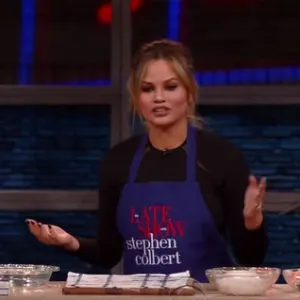 Chrissy Teigen talks baby names while cooking with Stephen Colbert