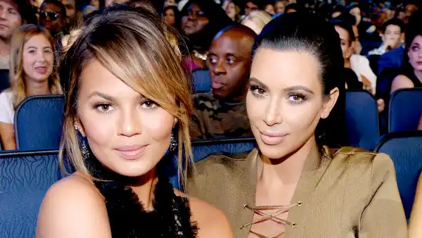 Chrissy Teigen and Kim Kardashian West attend the 2015 MTV Video Music Awards at Microsoft Theater on August 30, 2015 in Los Angeles, California.