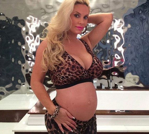 Coco Austin Shows off baby bump