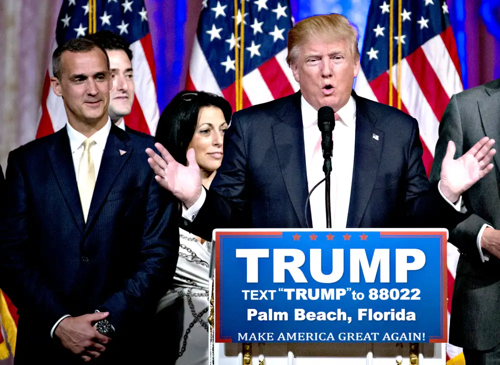Donald Trump, president and chief executive of Trump Organization Inc. and 2016 Republican presidential candidate, center, speaks during a news conference with Corey Lewandowski, campaign manager for Trump, left, at the Mar-A-Lago Club in Palm Beach, Florida, U.S., on Tuesday, March 15, 2016.