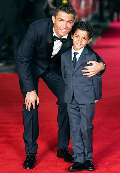 Cristiano Ronaldo and Cristiano Ronaldo Jr hug