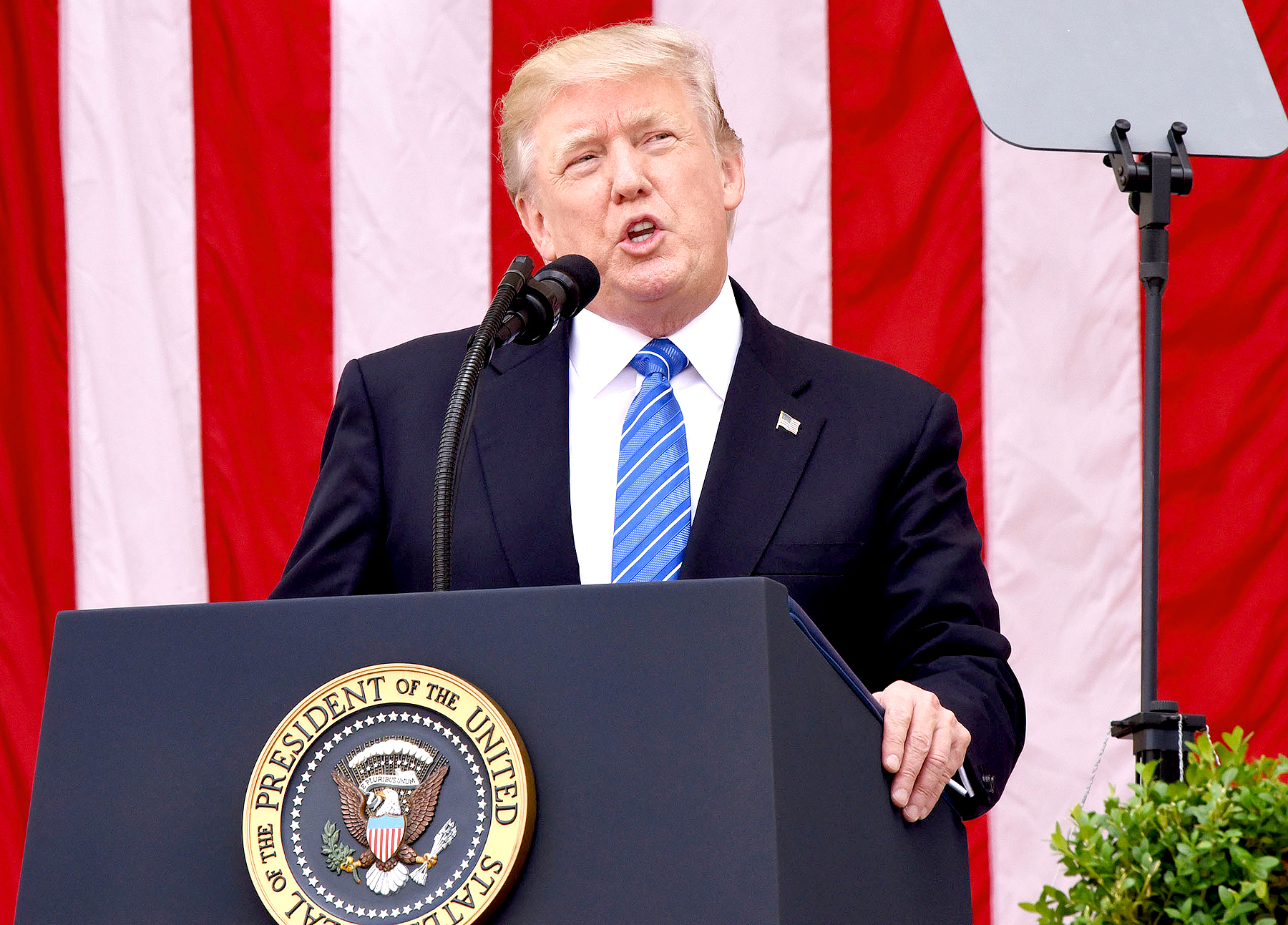 Donald Trump participates in a wreath-laying ceremony at the Tomb of the Unknown Soldier at Arlington National Cemetery on Memorial Day , May 29, 2017 in Arlington, Virginia.