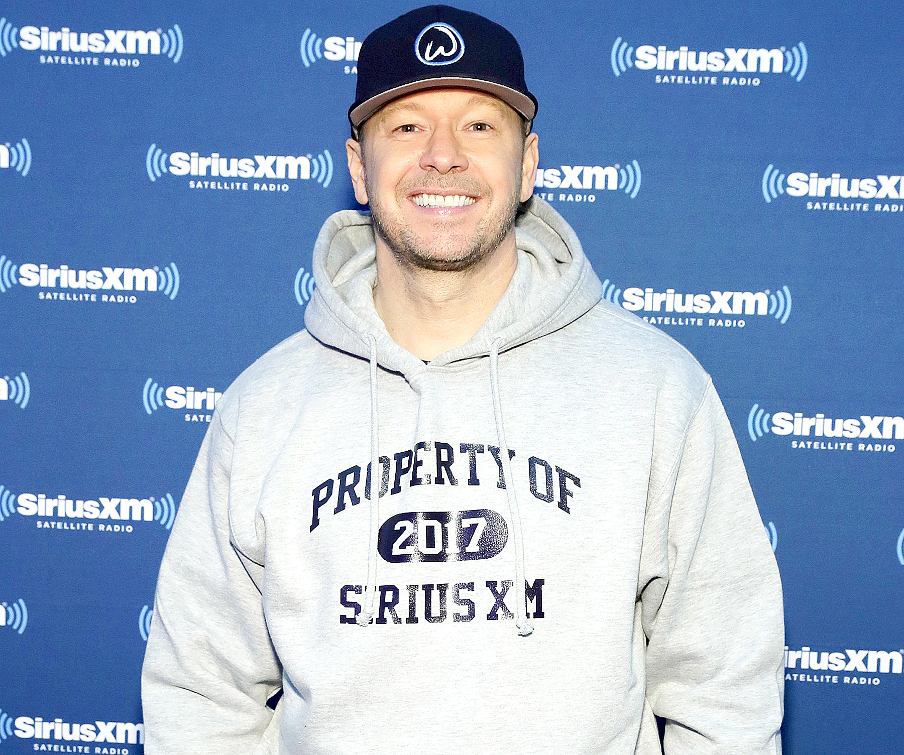 Donnie Wahlberg visits the SiriusXM set at Super Bowl LI Radio Row at the George R. Brown Convention Center on February 3, 2017 in Houston, Texas.
