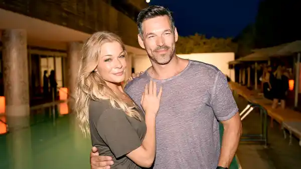 Eddie Cibrian and LeAnn Rimes attend the Maxim Magazine Worldwide Swimwear Collection launch at SLS South Beach on July 18, 2015 in Miami, Florida. Fabiano Silva/Getty Images for Maxim