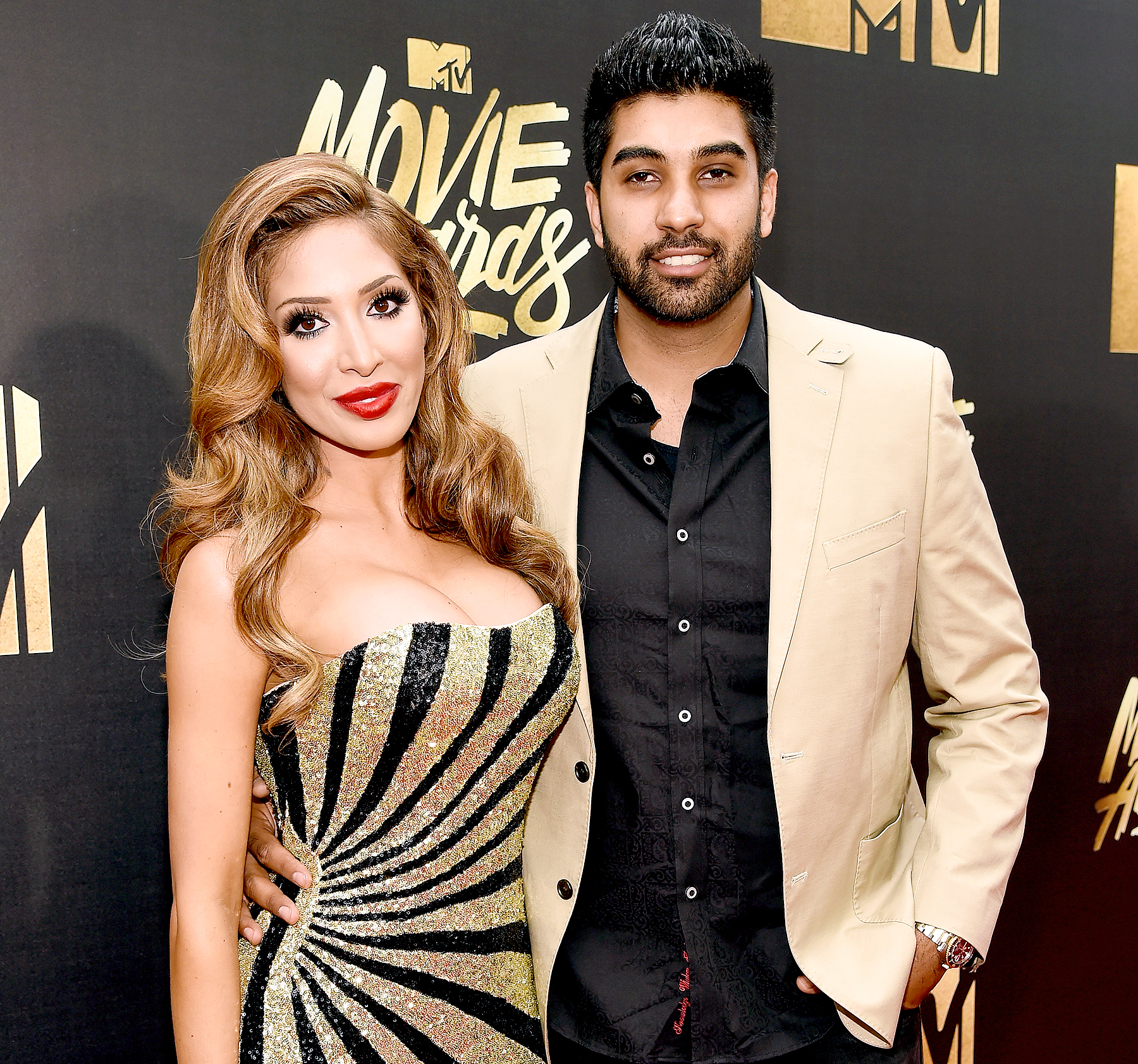 Farrah Abraham and Simon Saran attend the 2016 MTV Movie Awards at Warner Bros. Studios on April 9, 2016 in Burbank, California.