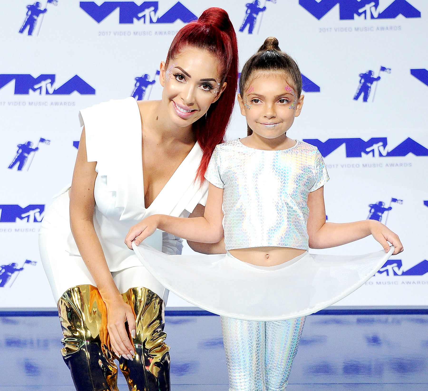 Farrah Abraham and daughter arrive at the 2017 MTV Video Music Awards at The Forum on August 27, 2017 in Inglewood, California.