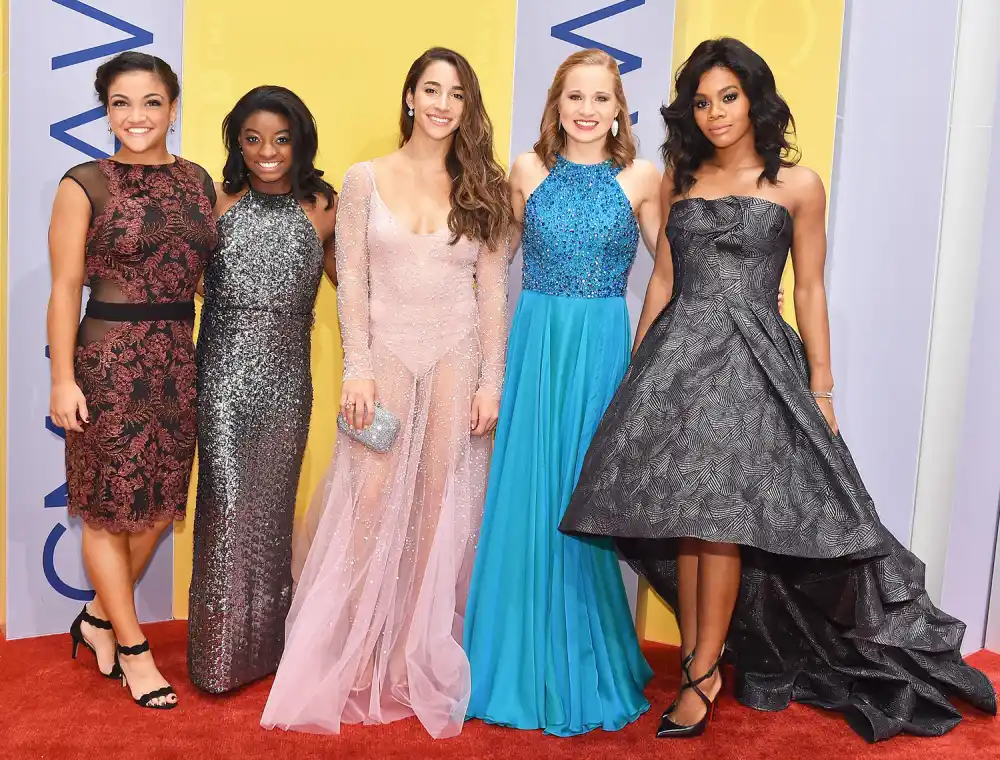 Laurie Hernandez, Simone Biles, Aly Raisman, Madison Kocian and Gabby Douglas (rom left) attend the 50th annual CMA Awards at the Bridgestone Arena on Nov. 2, 2016, in Nashville.