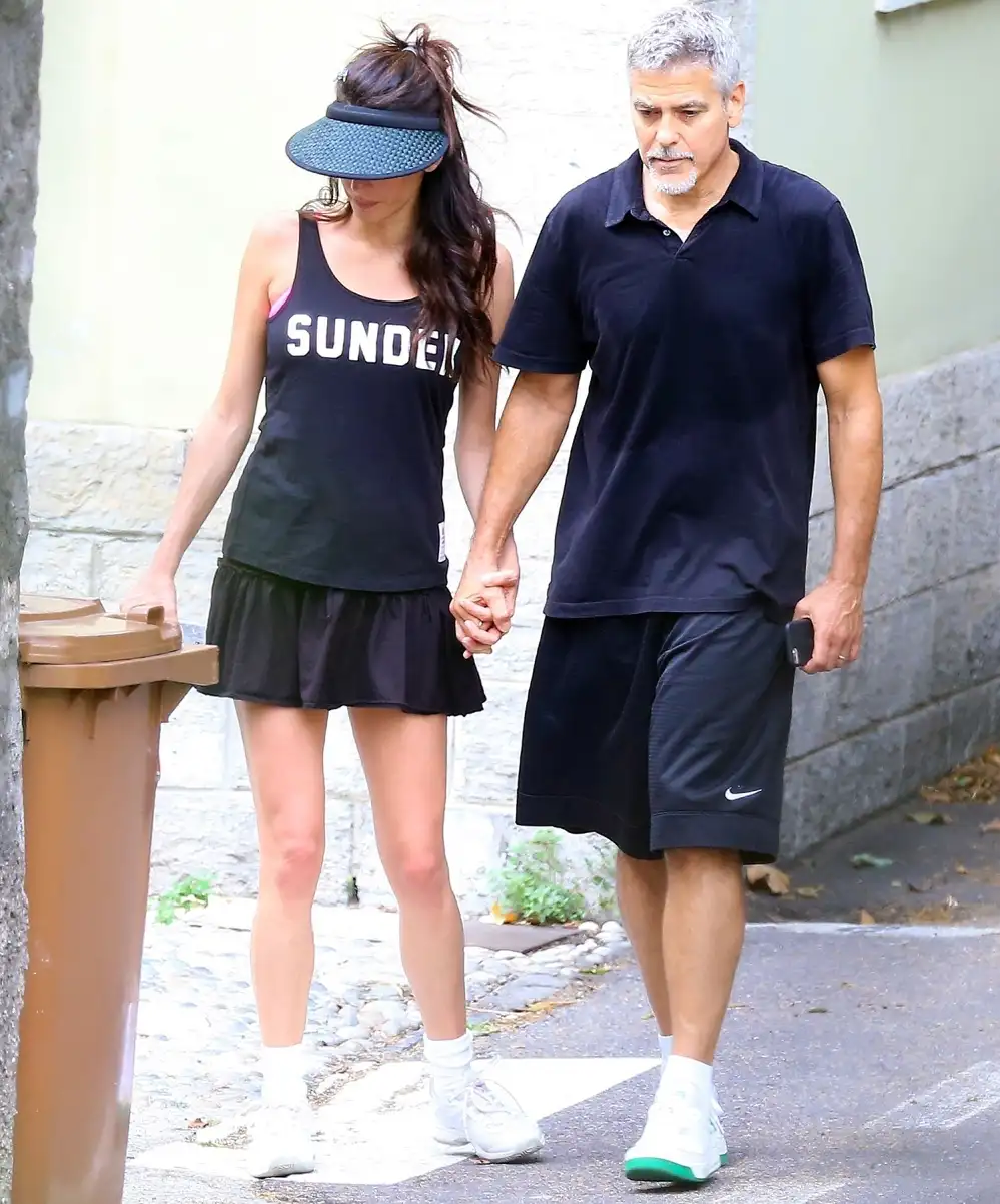 George Clooney and Amal Clooney head home after enjoying a tennis match together in Laglio, Italy, on August 17, 2017.