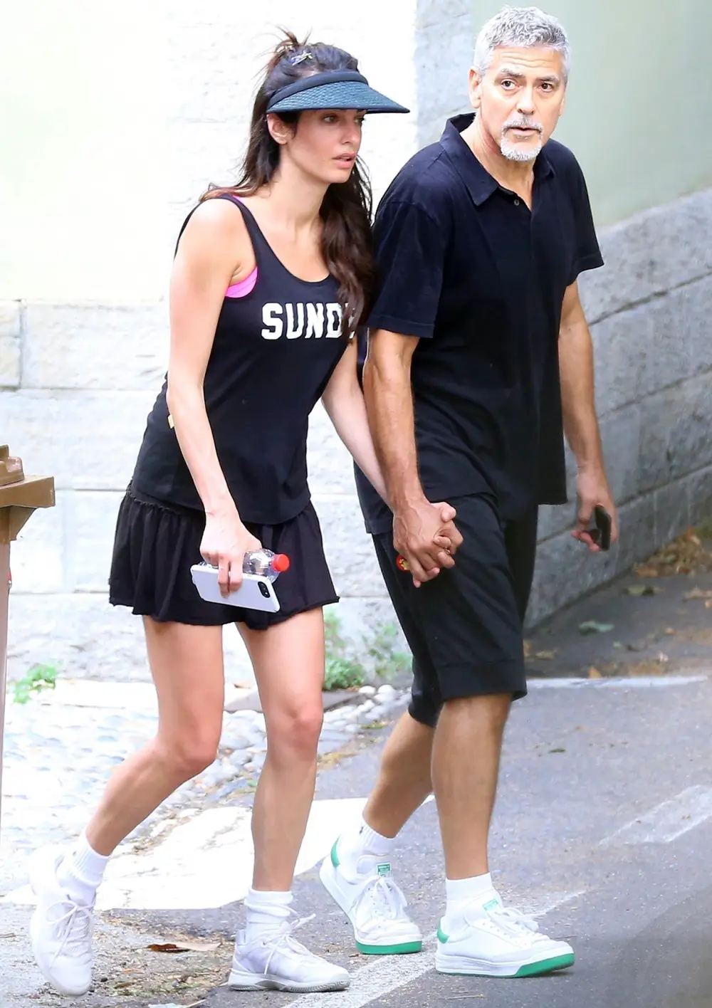 George Clooney and Amal Clooney head home after enjoying a tennis match together in Laglio, Italy, on August 17, 2017.