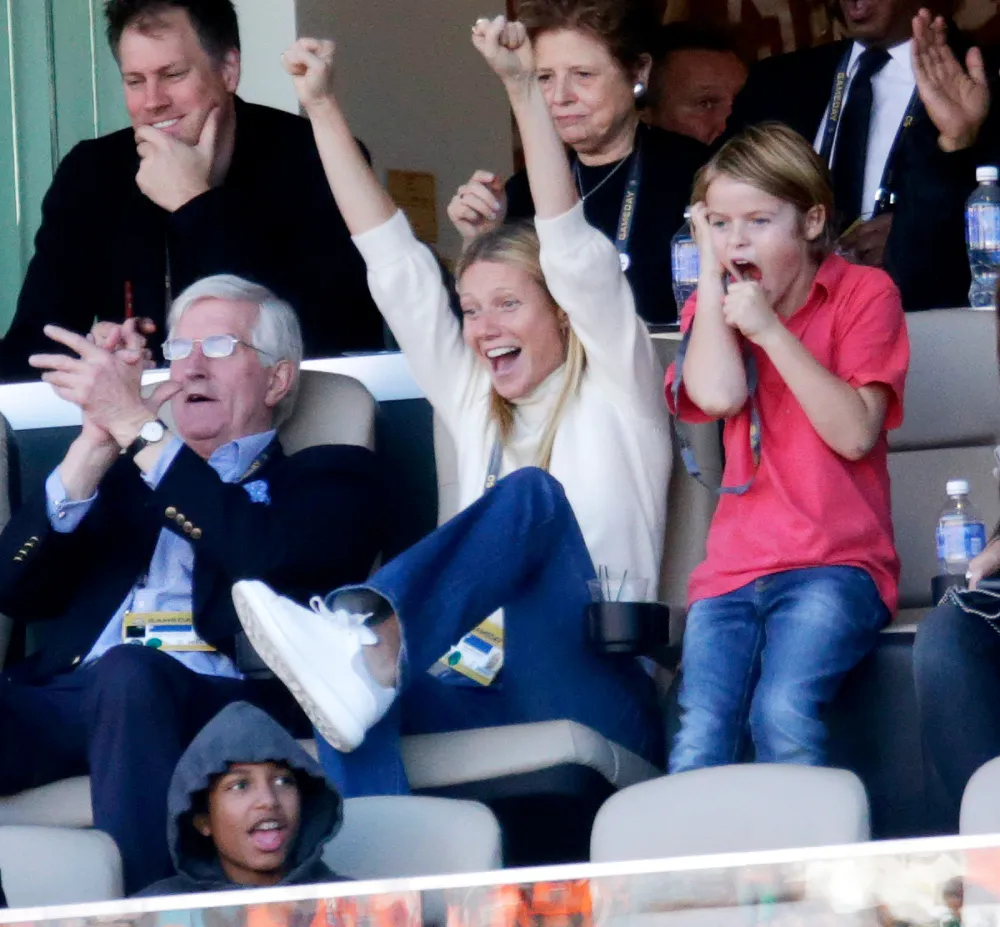 Gwyneth Paltrow and her son Moses Martin cheer from the sidelines at Super Bowl 50 in Santa Clara, California on February 7, 2016.