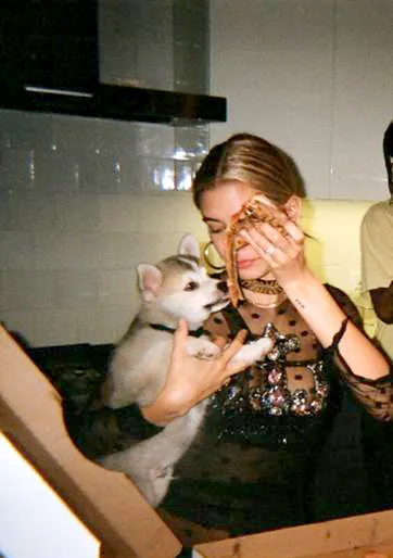 Hailey Baldwin uses Wag!, the new on-demand dog walking service, while celebrating Father&rsquo;s Day with her dad, Stephen Baldwin.