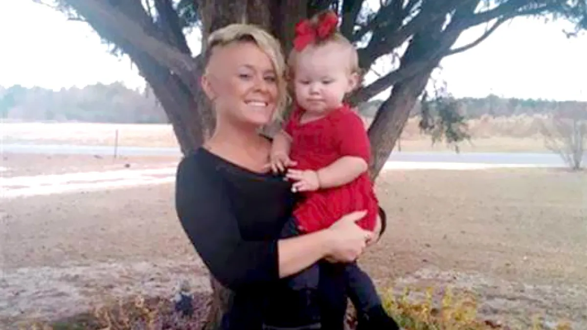 Heather Wilson and her toddler daughter, London,