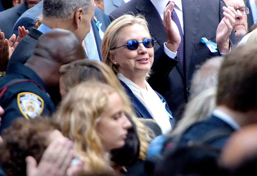 U.S. Democratic presidential nominee Hillary Clinton listens during a memorial service at the National 9/11 Memorial September 11, 2016 in New York.