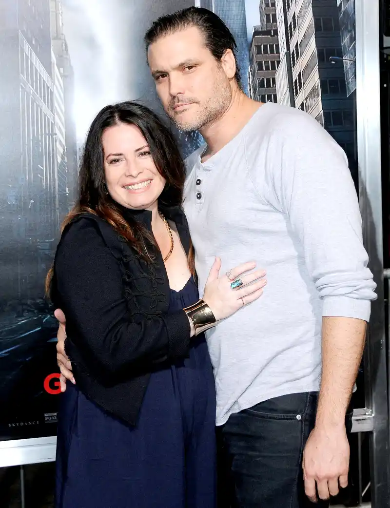 Holly Marie Combs and fiance Mike attend the premiere of Warner Bros. Pictures' 'Geostorm' at TCL Chinese Theatre on October 16, 2017 in Hollywood, California. 