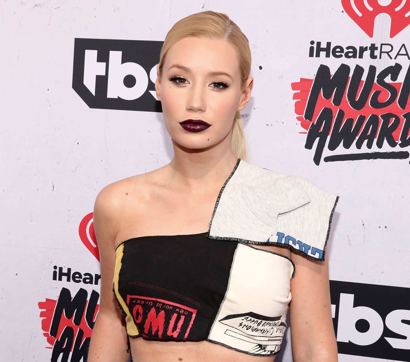 Iggy Azalea has hit back at reports she's cheating the IRS
