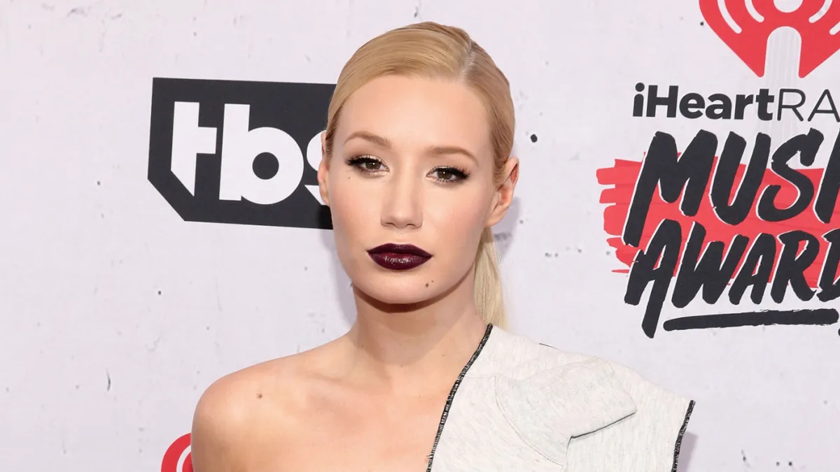 Iggy Azalea has hit back at reports she's cheating the IRS
