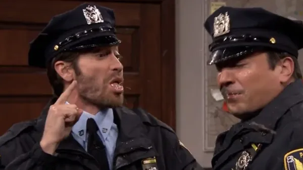 Jake Gyllenhaal and Jimmy Fallon spit at each other