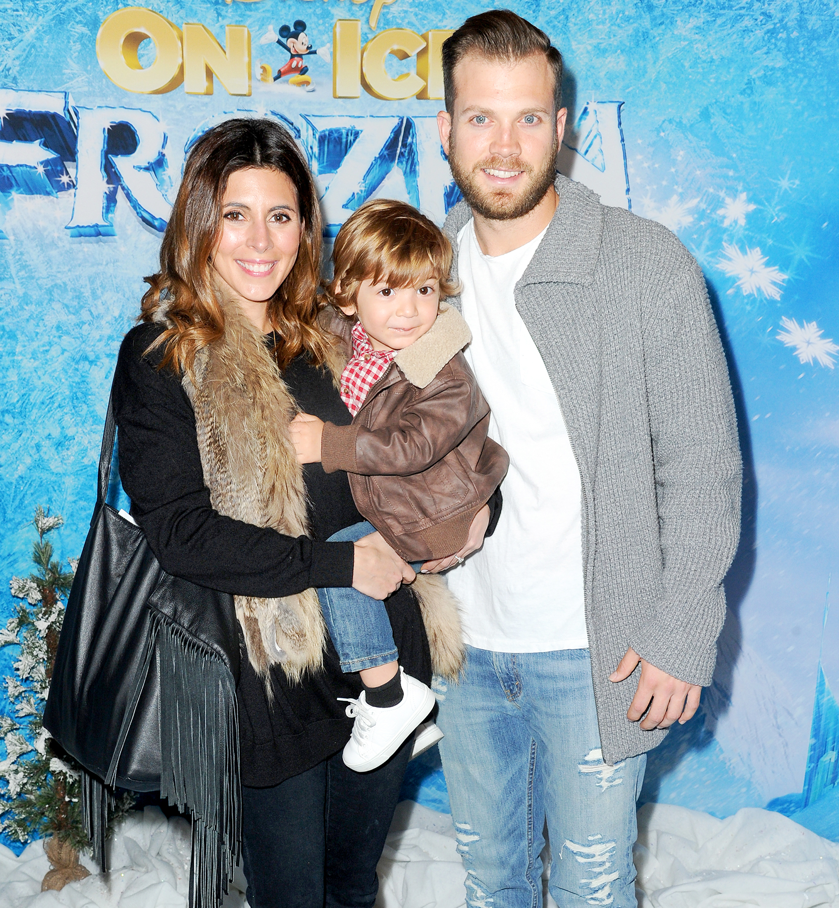 Jamie-Lynn Sigler and Cutter Dykstra with son Beau attend Frozen celebrity premiere presented by Disney On Ice held at the Staples Center on Thursday, Dec.10, 2015, in Los Angeles.