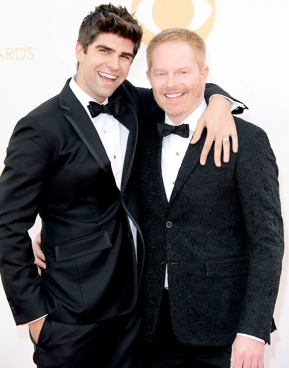 Jesse Tyler Ferguson and Justin Mikita arrive at the 65th Annual Primetime Emmy Awards held at Nokia Theatre L.A. Live on September 22, 2013 in Los Angeles, California.