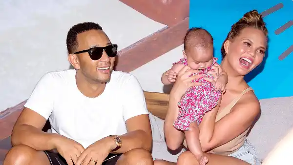 BROOKLYN, NY - AUGUST 28: Model Chrissy Teigen and musician John Legend with their baby Luna Simone Stephens attend the 2016 Sports Illustrated Summer Of Swim Fan Festival & Concert at Ford Amphitheater at Coney Island Boardwalk on August 28, 2016 in Brooklyn, New York. (Photo by Michael Stewart/WireImage)