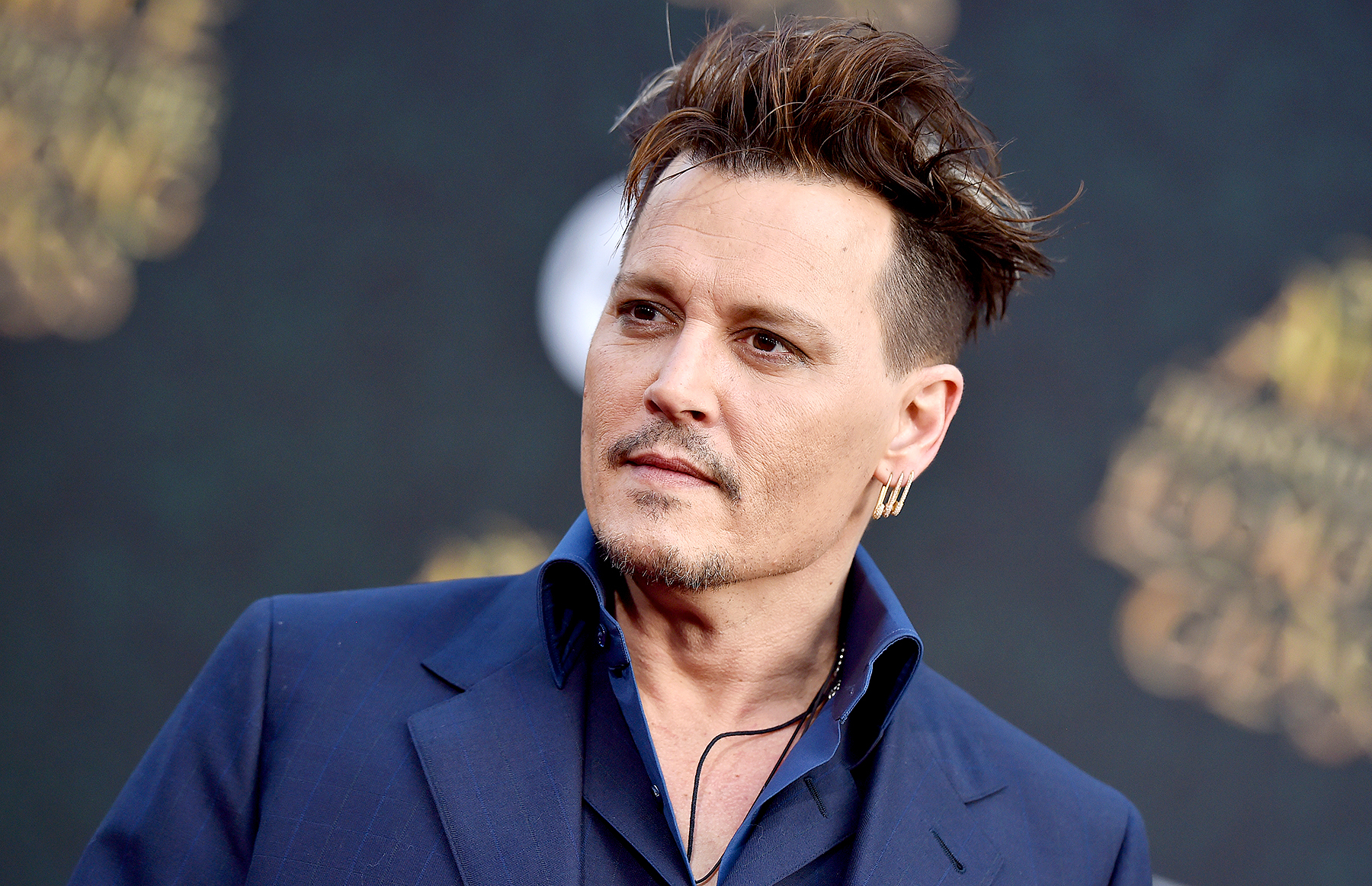 Johnny Depp arrives at the premiere of Disney's 'Alice Through The Looking Glass' at the El Capitan Theatre on May 23, 2016 in Hollywood, California.