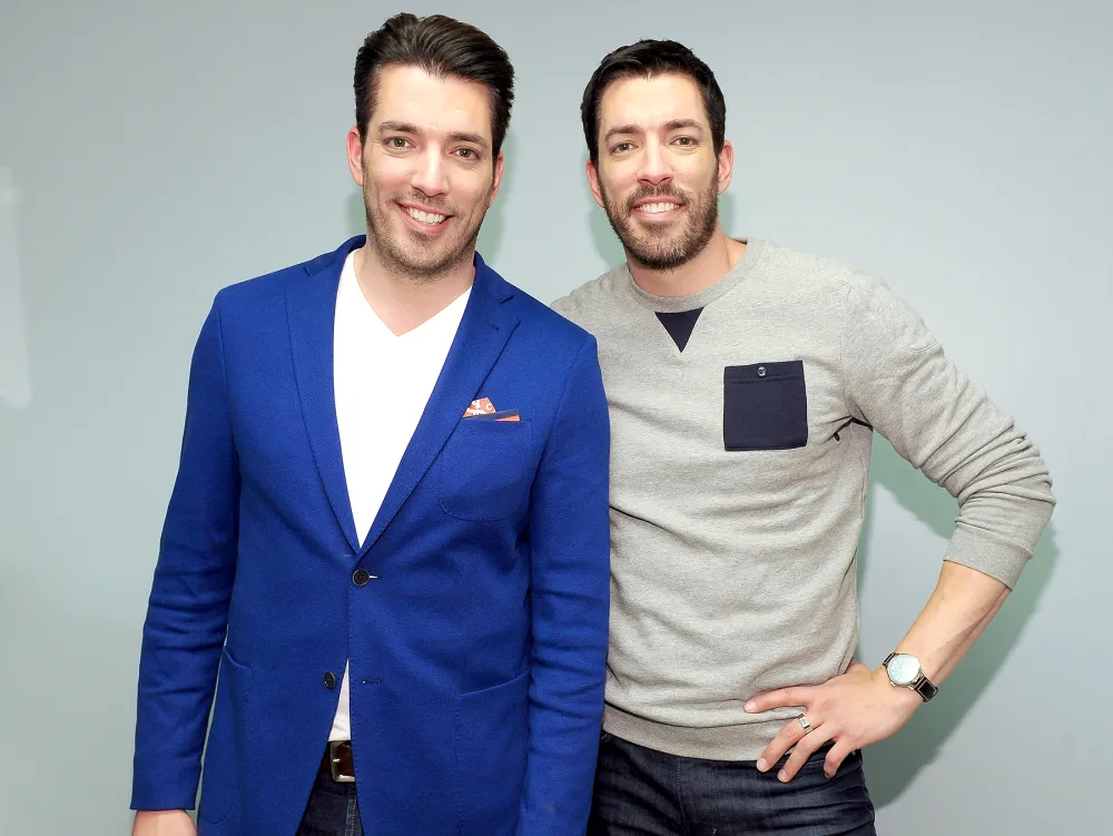 Jonathan Scott and Drew Scott of the "Property Brothers" attend the launch of their new book "Dream Replica Luxury Handbag" at Indigo Manulife Centre on April 15, 2016 in Toronto, Canada.