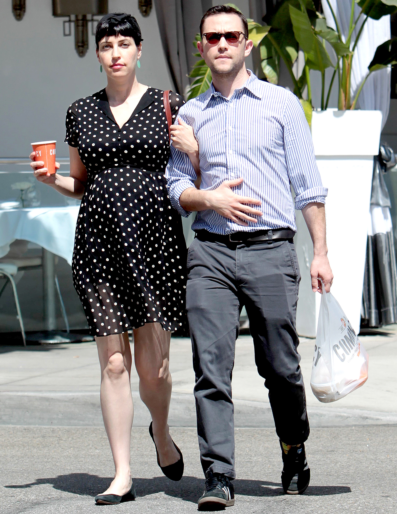Joseph Gordon-Levitt is spotted walking arm in arm with his pregnant wife Tasha McCauley after enjoying lunch together at Comoncy in Beverly Hills, California in May 2017.