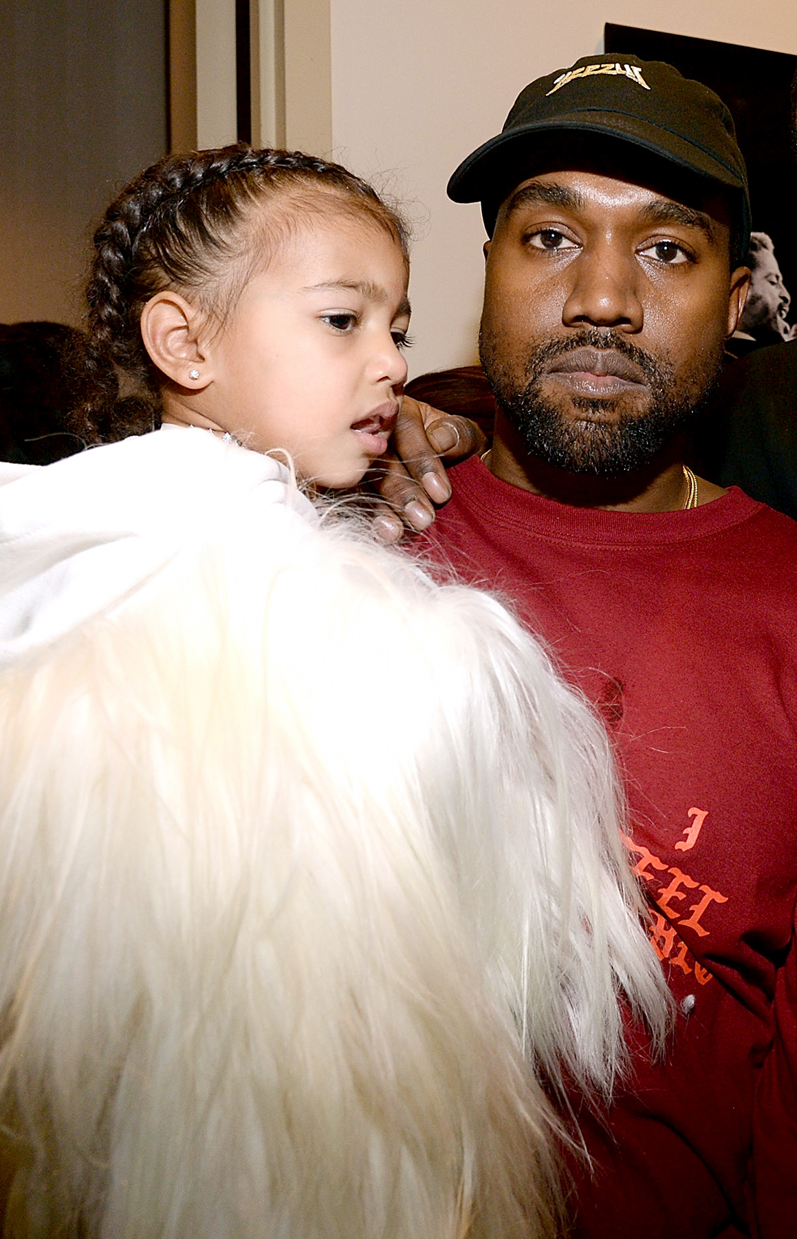 North West and Kanye West attend Kanye West Yeezy Season 3 at Madison Square Garden on February 11, 2016 in New York City.