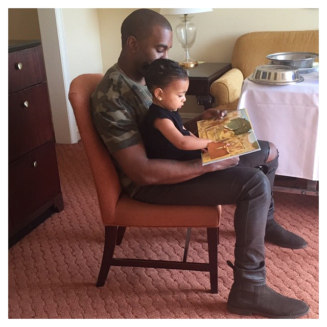 Kanye West reads to North West