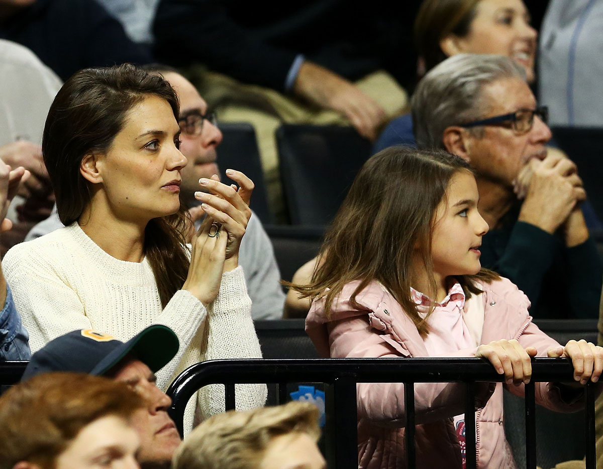 Katie Holmes and Suri Cruise watch a Notre Dame game