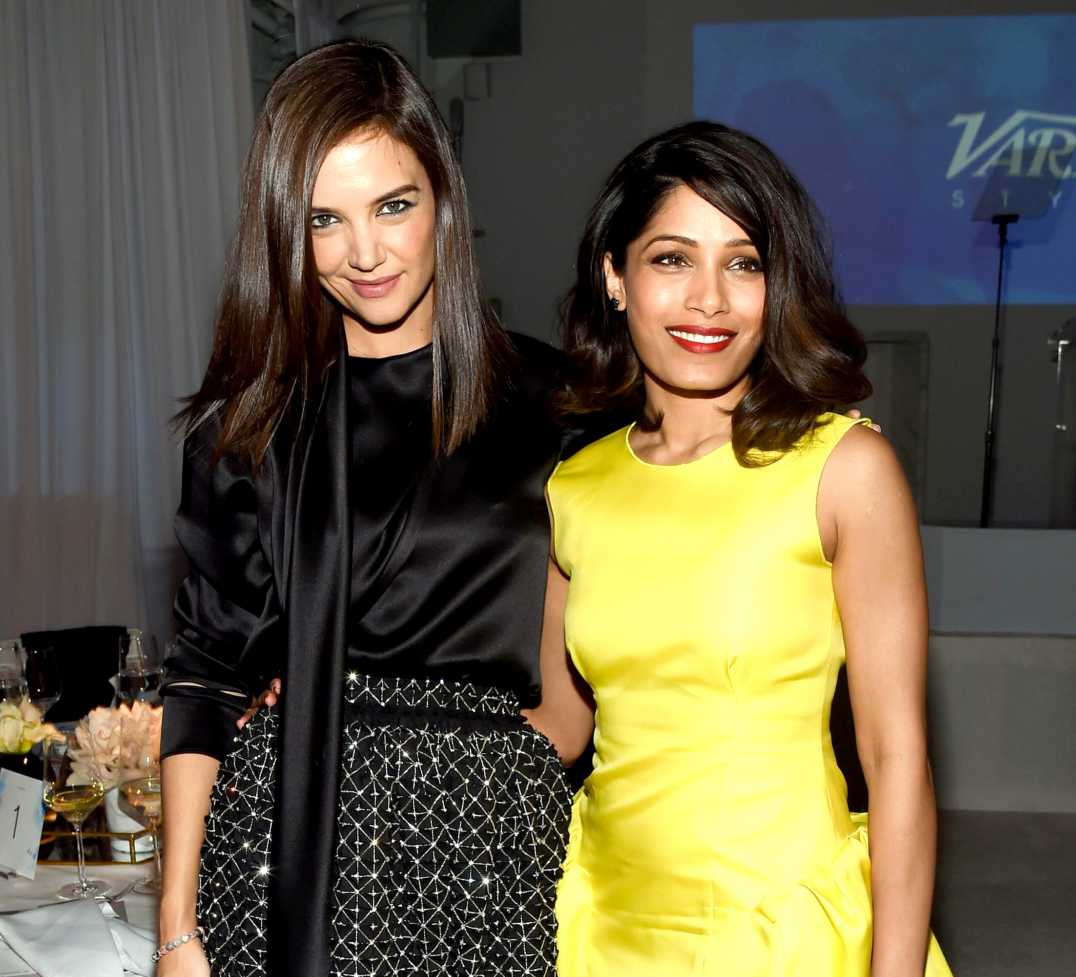 Katie Holmes and Freida Pinto attend the WWD And Variety's Stylemakers Event at Smashbox Studios on November 19, 2015 in Culver City, California.