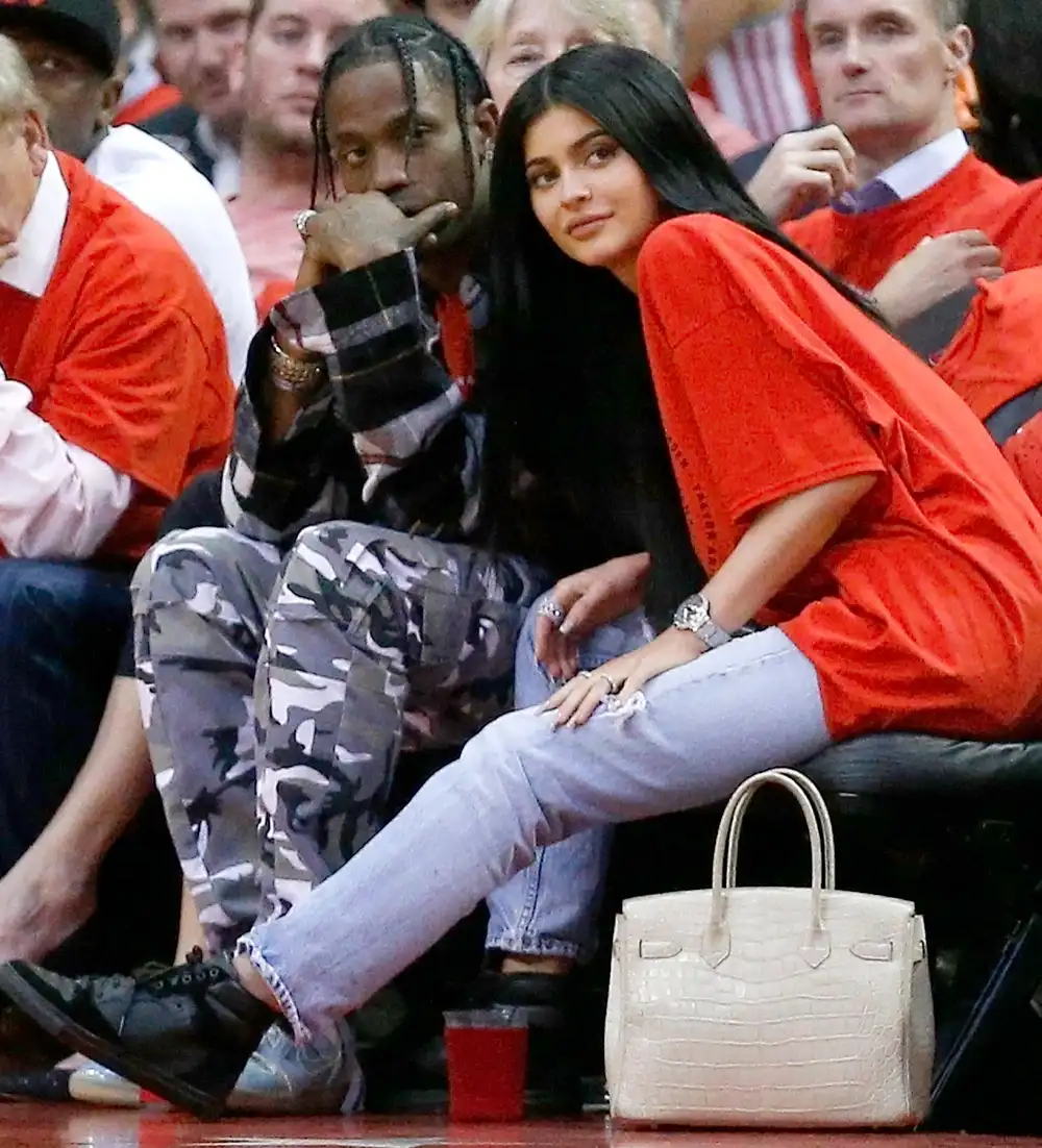 Travis Scott and Kylie Jenner watch courtside during Game Five of the Western Conference Quarterfinals game of the 2017 NBA Playoffs at Toyota Center on April 25, 2017 in Houston, Texas.