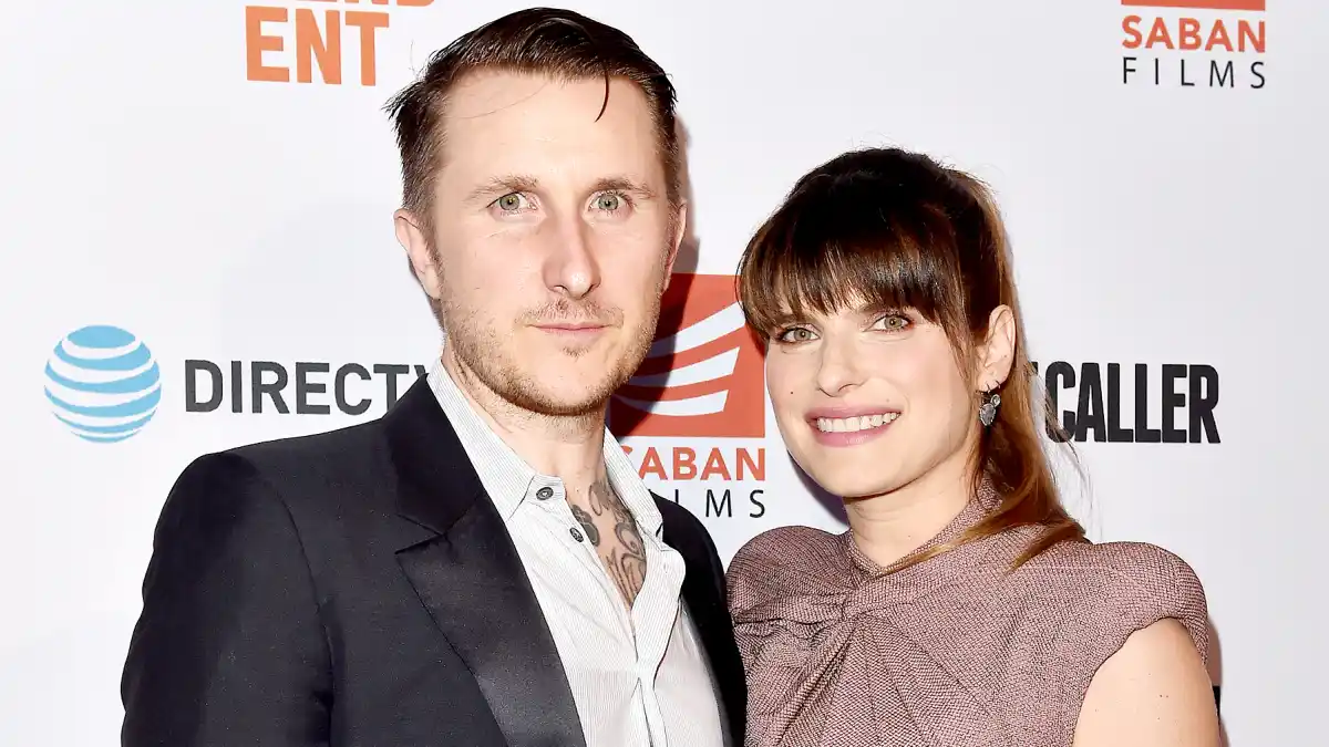 Lake Bell and husband Scott Campbell arrive at the premiere of 'Shot Caller' at The Theatre at Ace Hotel on August 15, 2017 in Los Angeles, California.
